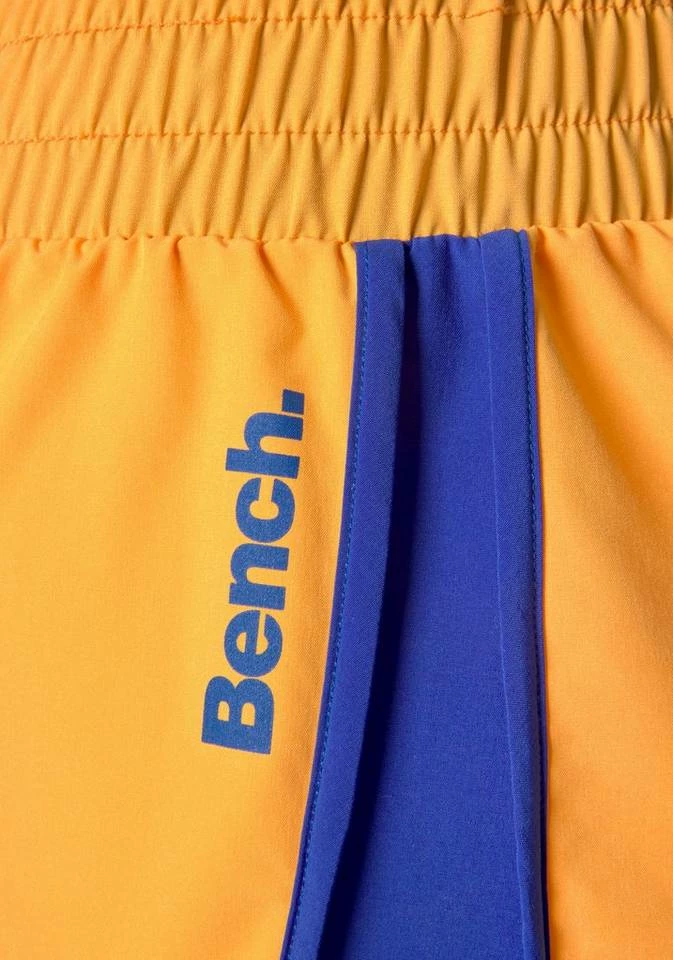 Bench. Funktionsshorts mit seitlichen Kontrasteinsätzen Blau-orange, Orange-blau 4 Bench. Funktionsshorts mit seitlichen Kontrasteinsätzen Blau-orange, Orange-blau – Bild 4